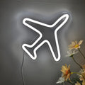 Handmade neon sign in the shape of an airplane