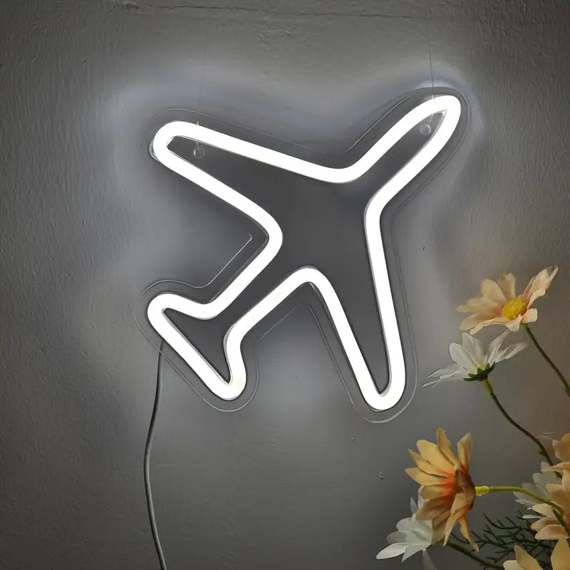 Handmade neon sign in the shape of an airplane